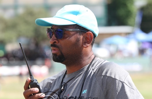 Coach David Riley on the track